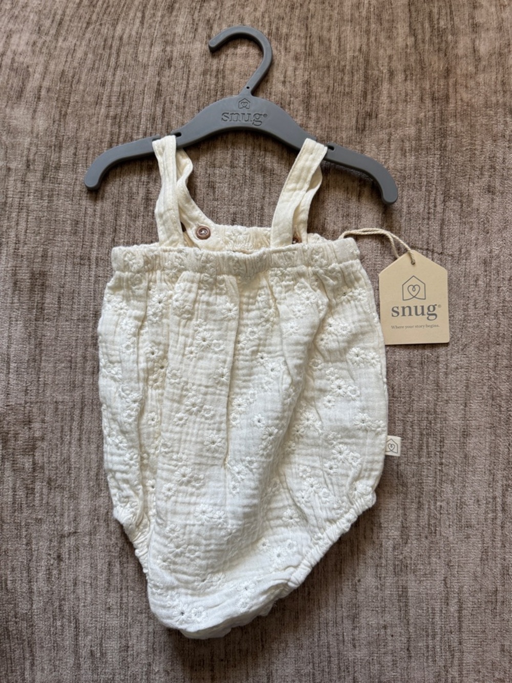 Snug Cream Eyelet Baby Romper with Adjustable Straps